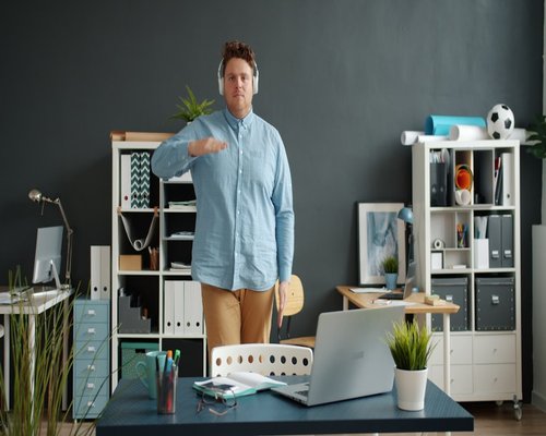 Employee stretching during office break